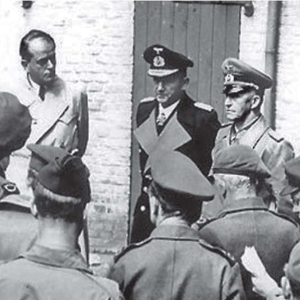 Pressefoto von drei Vertretern der Reichsregierung