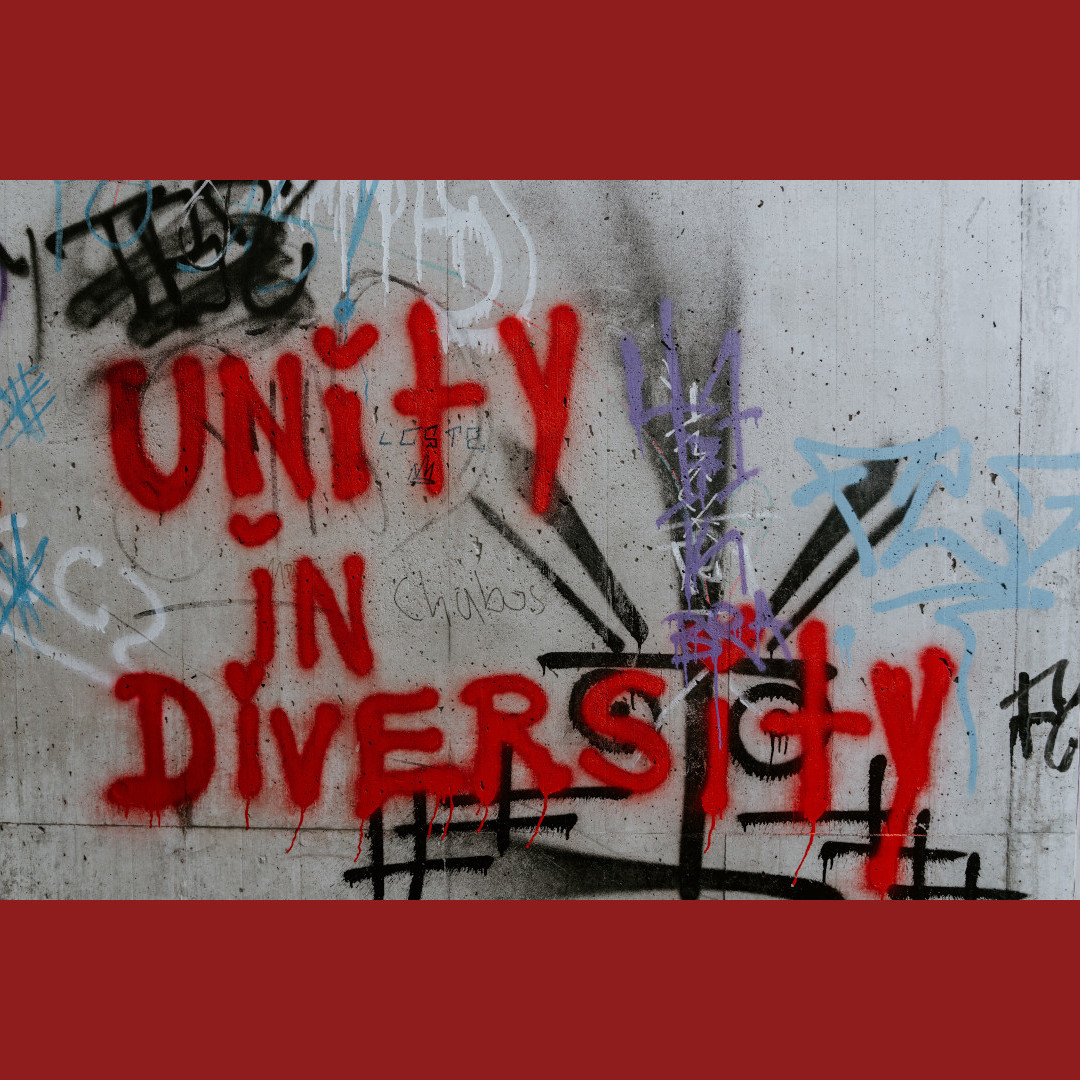 Graffiti "Unity in diversity" auf Mauer